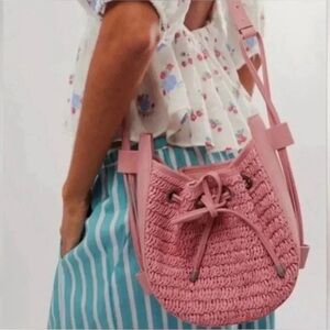 Free People Cabana Woven Drawstring Crossbody Bag in Vintage Pink